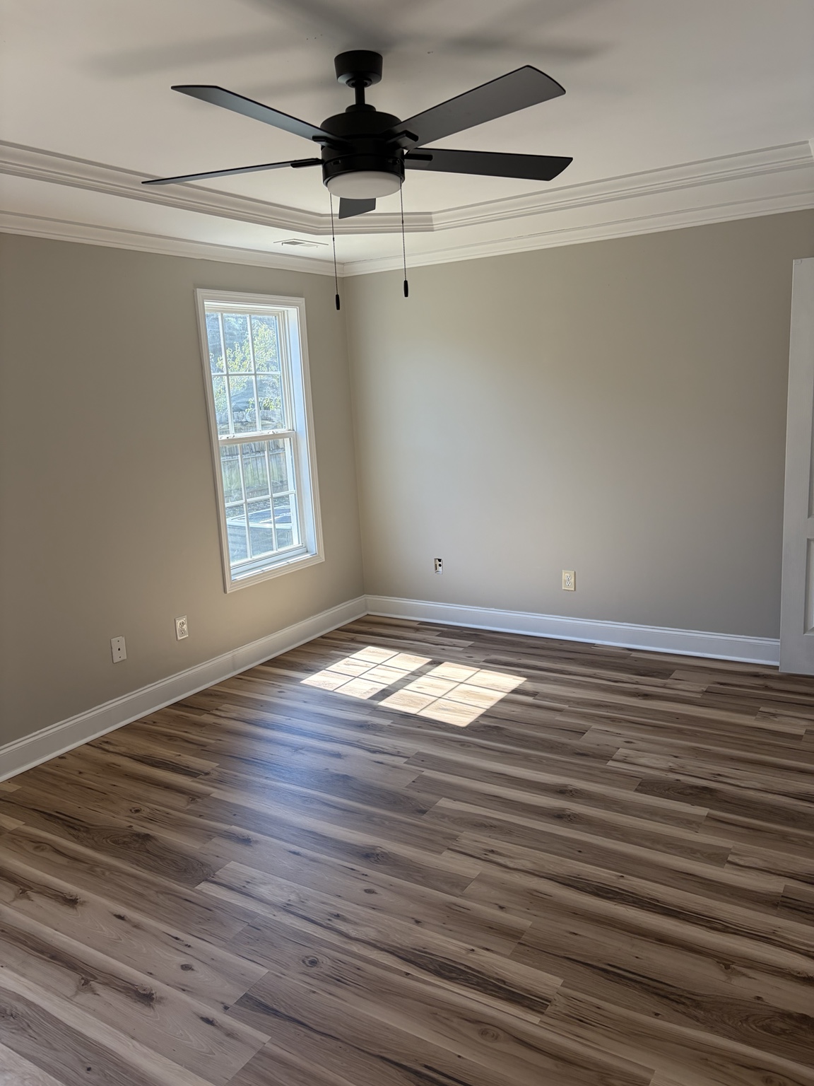 Unfurnished interior room with a window